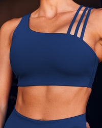 Woman wearing Galvanise Sports Bra 2.0 - Midnight Blue | Model:Dani | Size:S