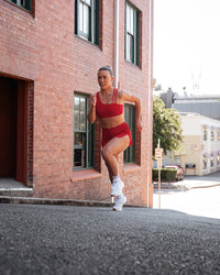 Woman wearing Galvanise Sports Bra 2.0 - Scarlet | Model:Trista | Size:S