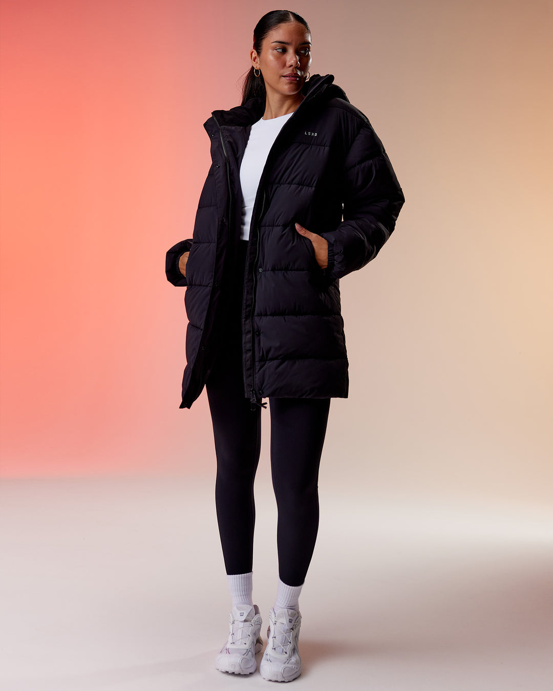 Woman wearing Go-To Puffer Long Jacket - Black | Model:Ella | Size:S