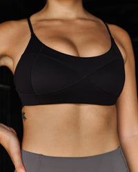 Woman wearing Infinite Contour Sports Bra - Black | Model:Stella | Size:S