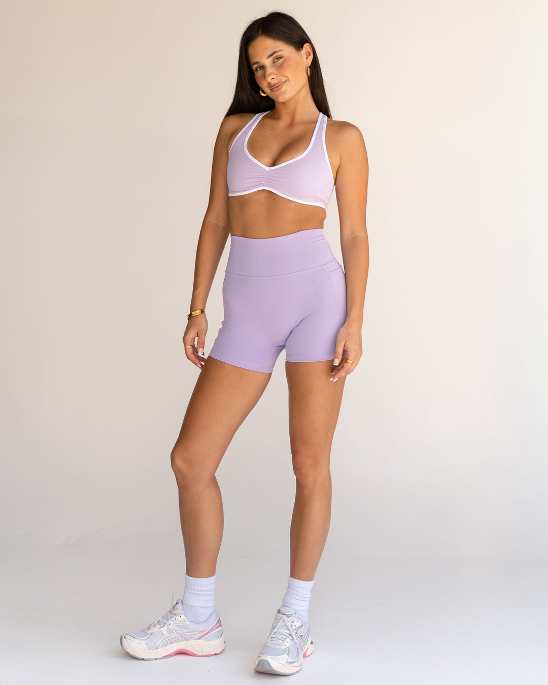 Woman wearing Luminous Sports Bra - Pale Lilac-White | Model:Jordi | Size:S
