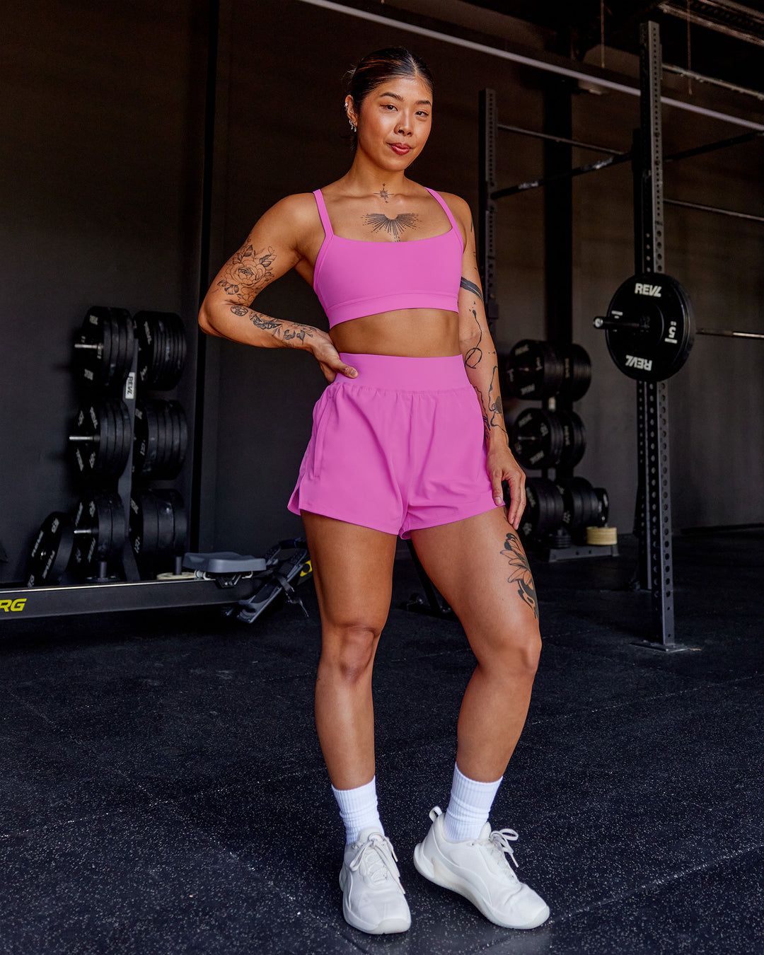 Woman wearing Momentum Sports Bra - Ultra Fuchsia | Model:Beccie | Size:S