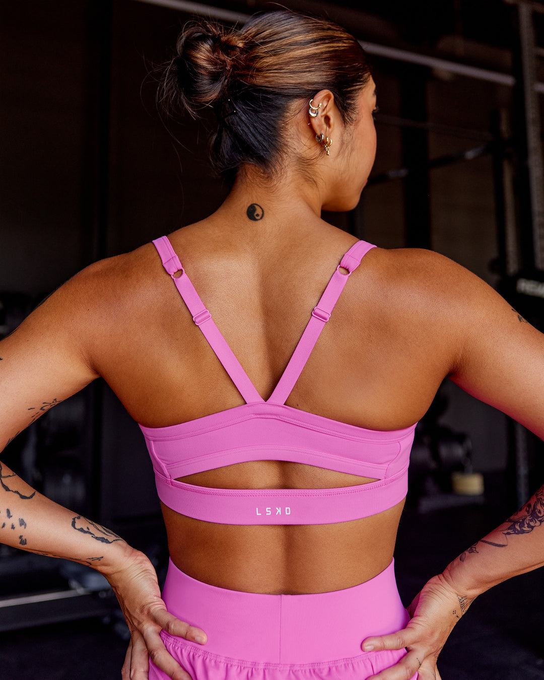 Woman wearing Momentum Sports Bra - Ultra Fuchsia | Model:Beccie | Size:S