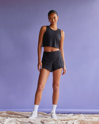 Woman wearing Movement CloudFLX 3" Short - Black | Model:Tali | Size:S