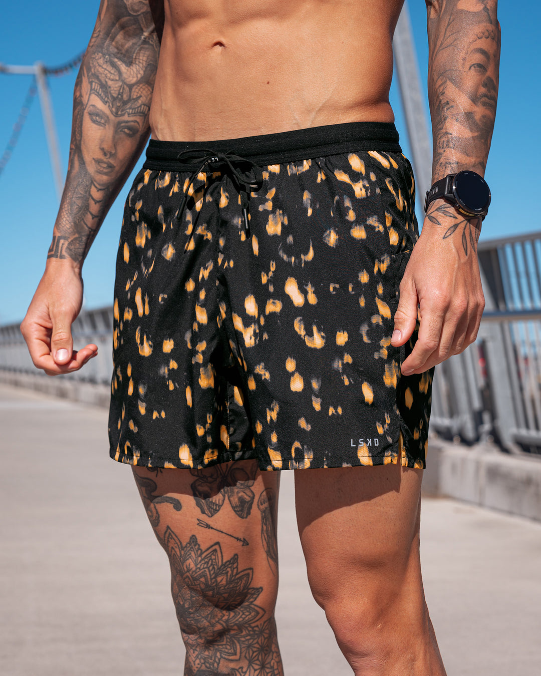 Man wearing Pace 5" Lined Running Short - Markings Black Print | Model:Tommy | Size:S