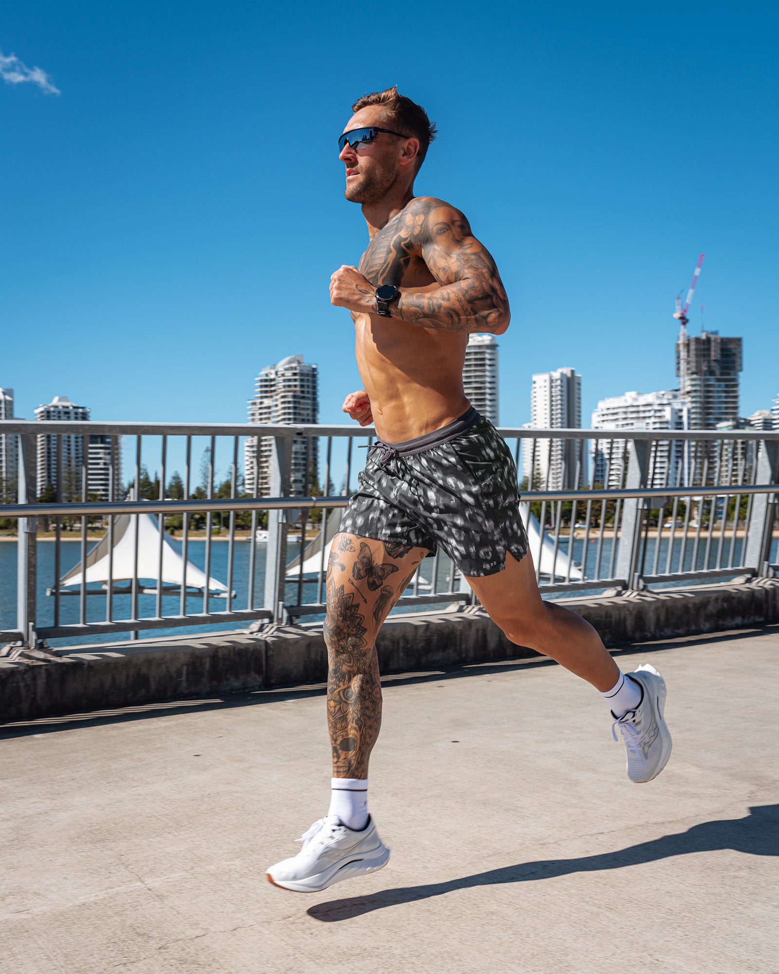 Man wearing Pace 5" Lined Running Short - Markings Dark Storm Print | Model:Tommy | Size:S