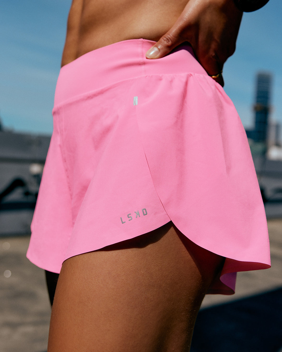 Woman wearing Pacer 3" Run Short - Candy Pink | Model:Mikeala | Size:S