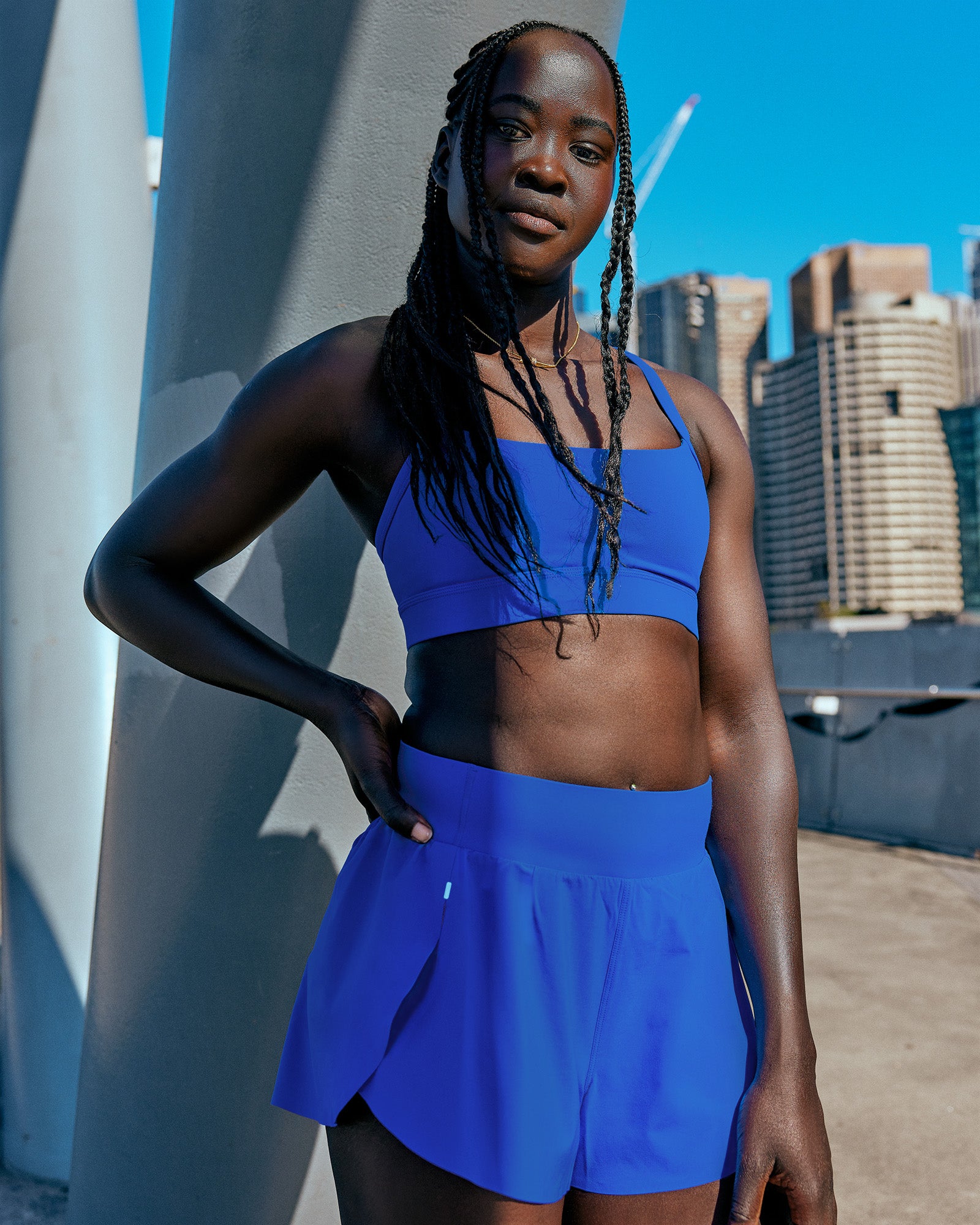 Woman wearing Pacer 3" Run Short - Electric Indigo | Model:Elizabeth | Size:S