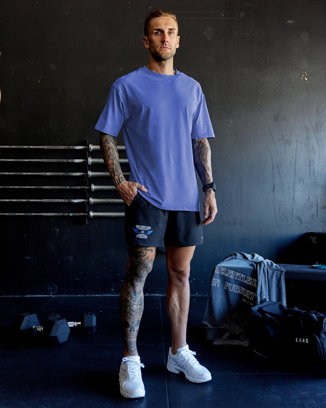 Man wearing Relentless Washed FLXCotton Oversized Tee - Power Cobalt-White | Model:Tommy | Size:S