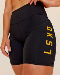 Woman wearing Rep Ultra High-Rise 6" Short Pockets - Black-Zinnia | Model:Tenaya | Size:S