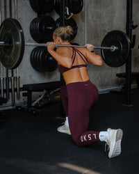 Woman wearing Rep Ultra High-Rise Full Length Legging Pockets - Cherry Lacquer-White | Model:Lyss | Size:S