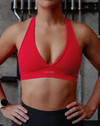 Woman wearing Stamina Sports Bra - Scarlet | Model:Lyss | Size:S