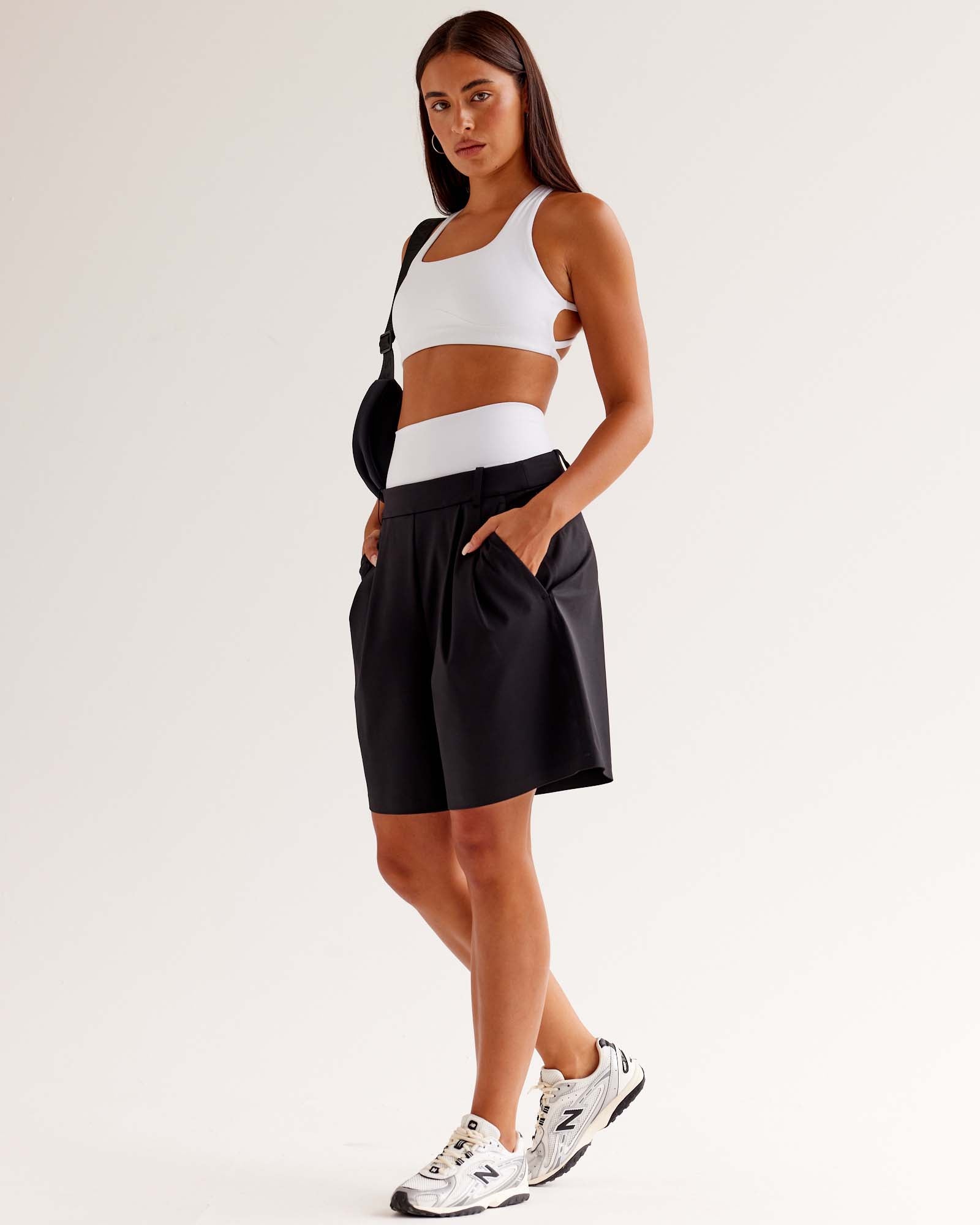 Woman wearing StretchShift Wide Leg Short - Black | Model:Ruby | Size:S