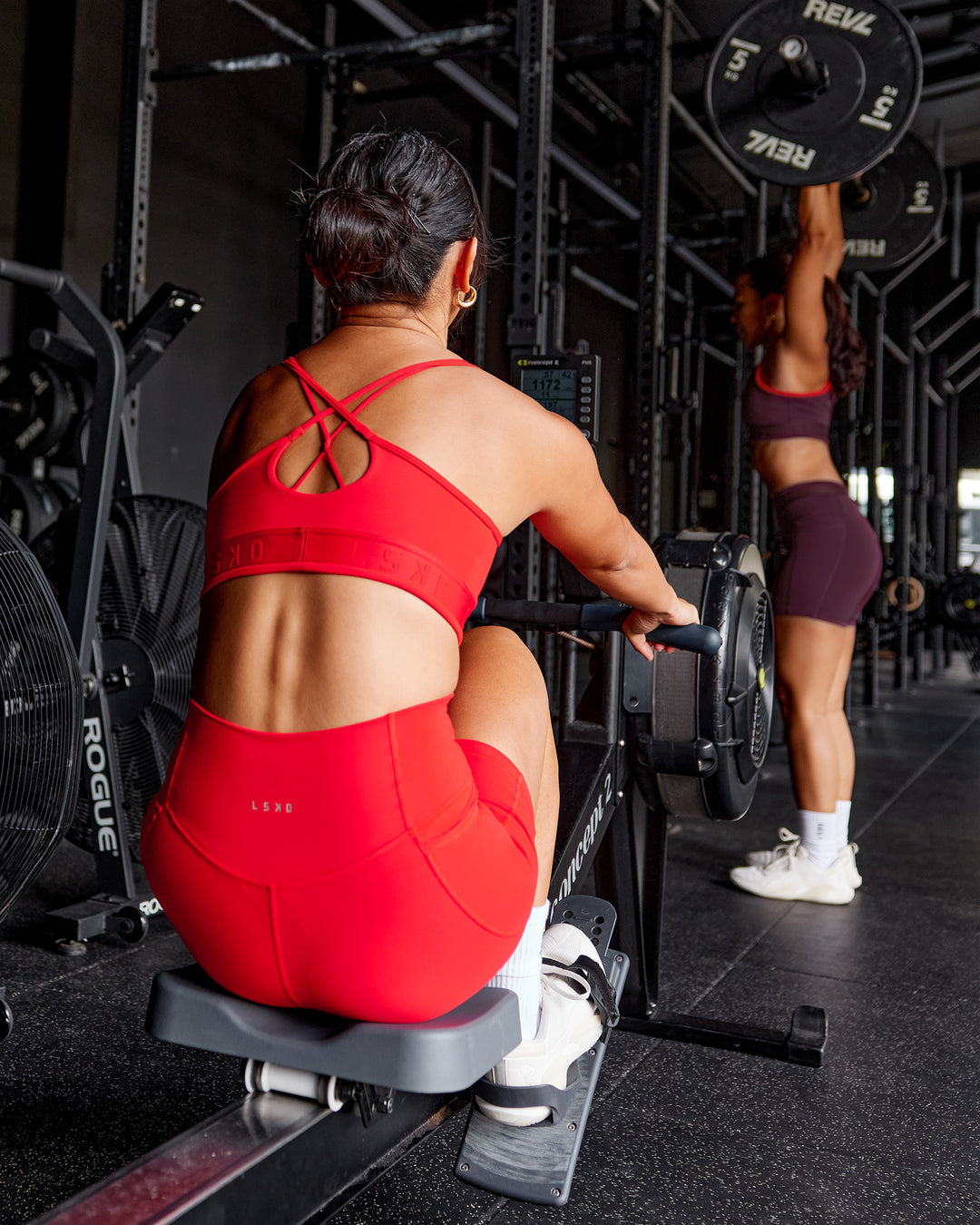 Woman wearing Strive Jacquard Sports Bra - Flame | Model:Iris | Size:S