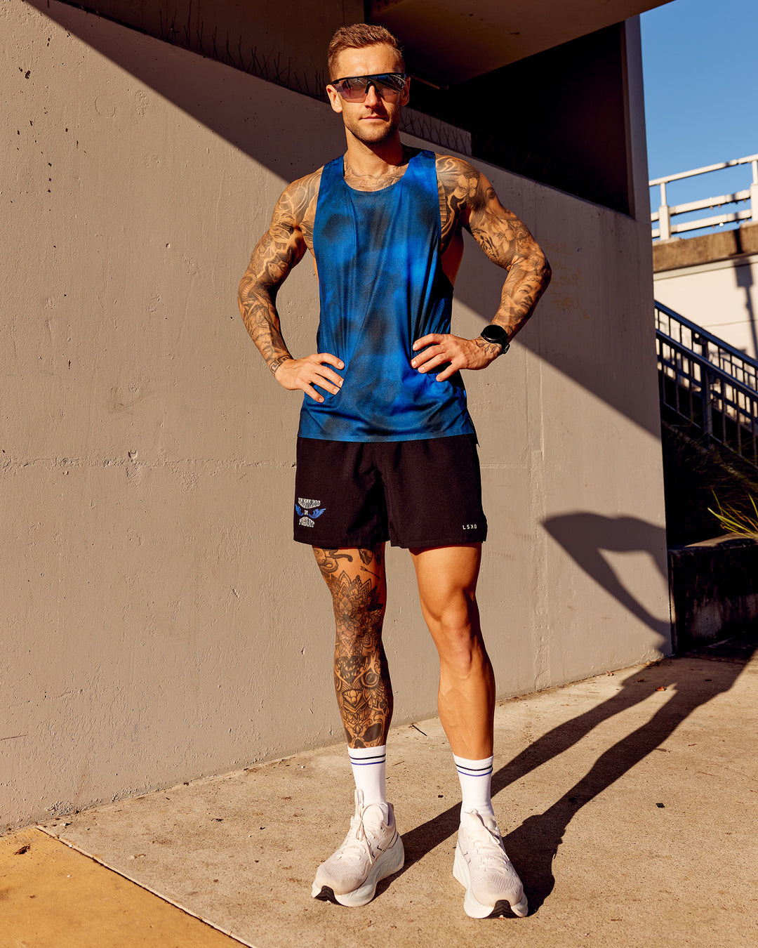 Man wearing Tommy Newell Pace 5&quot; Lined Performance Short - Black | Model:Tommy | Size:S