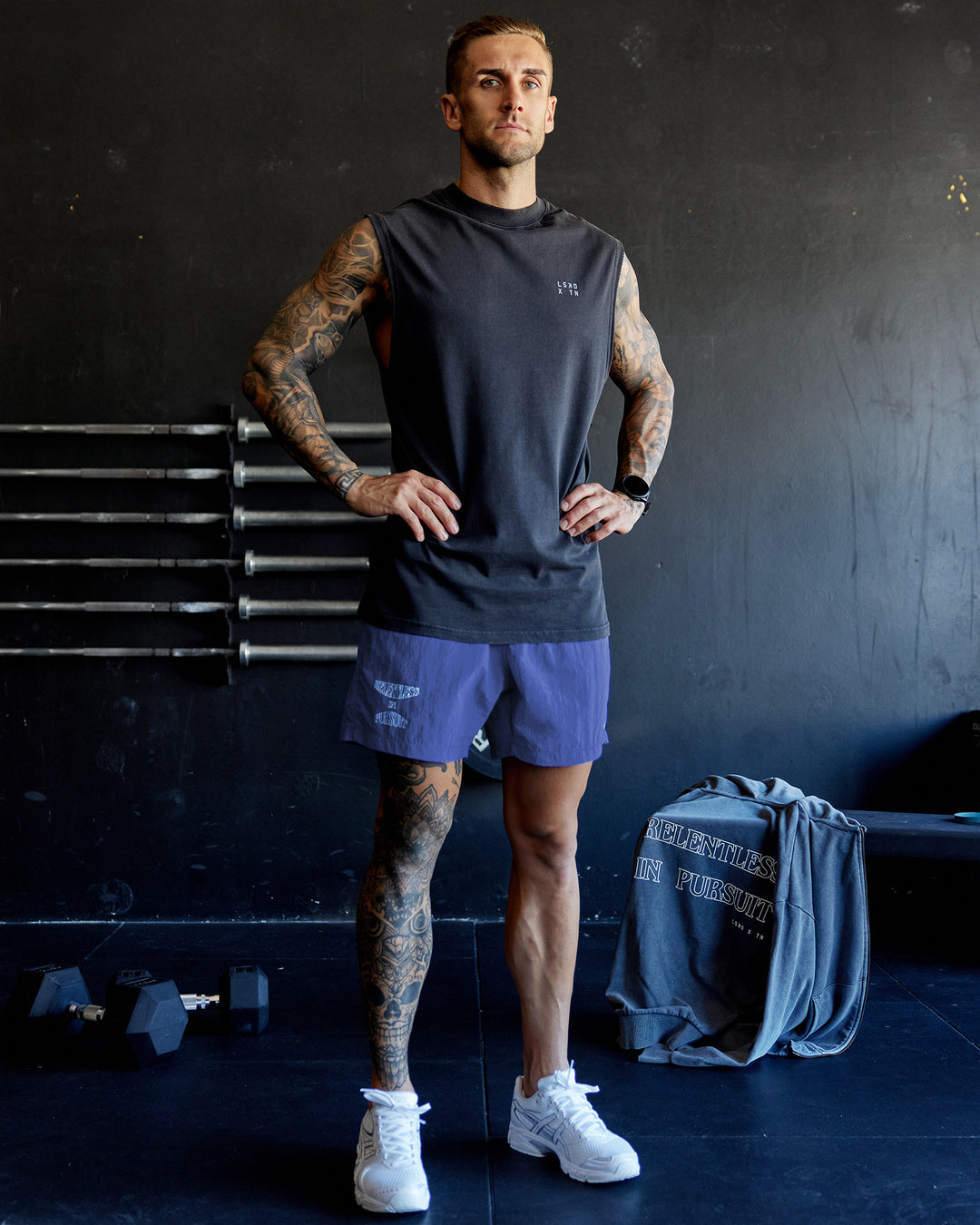 Man wearing Washed Relentless Heavyweight Oversized Tank - Black-Grey | Model:Tommy | Size:S