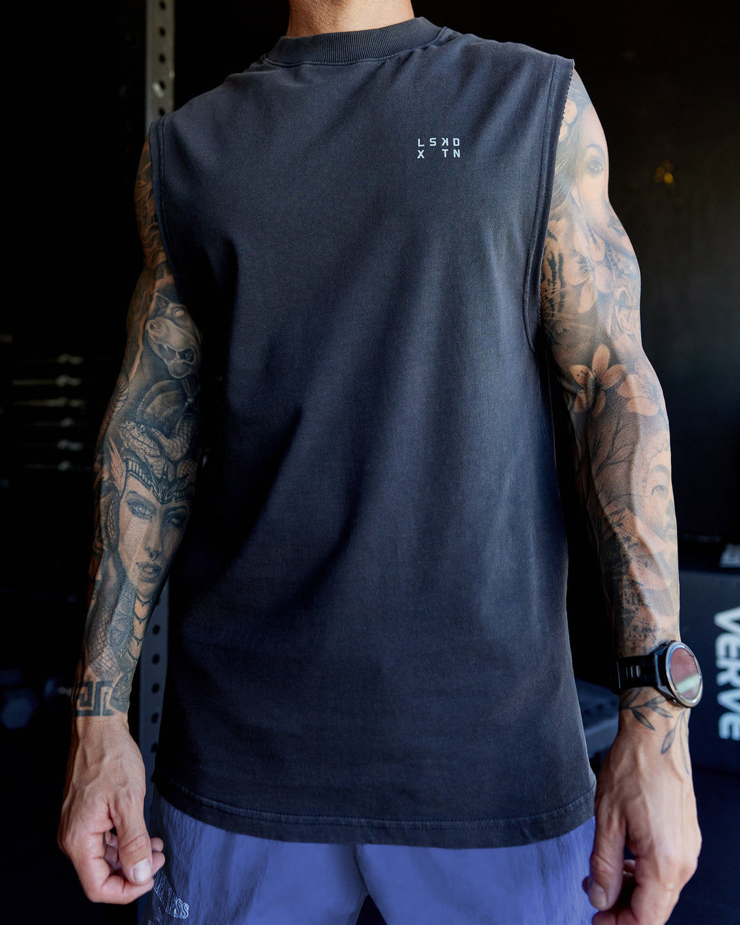 Man wearing Washed Relentless Heavyweight Oversized Tank - Black-Grey | Model:Tommy | Size:S