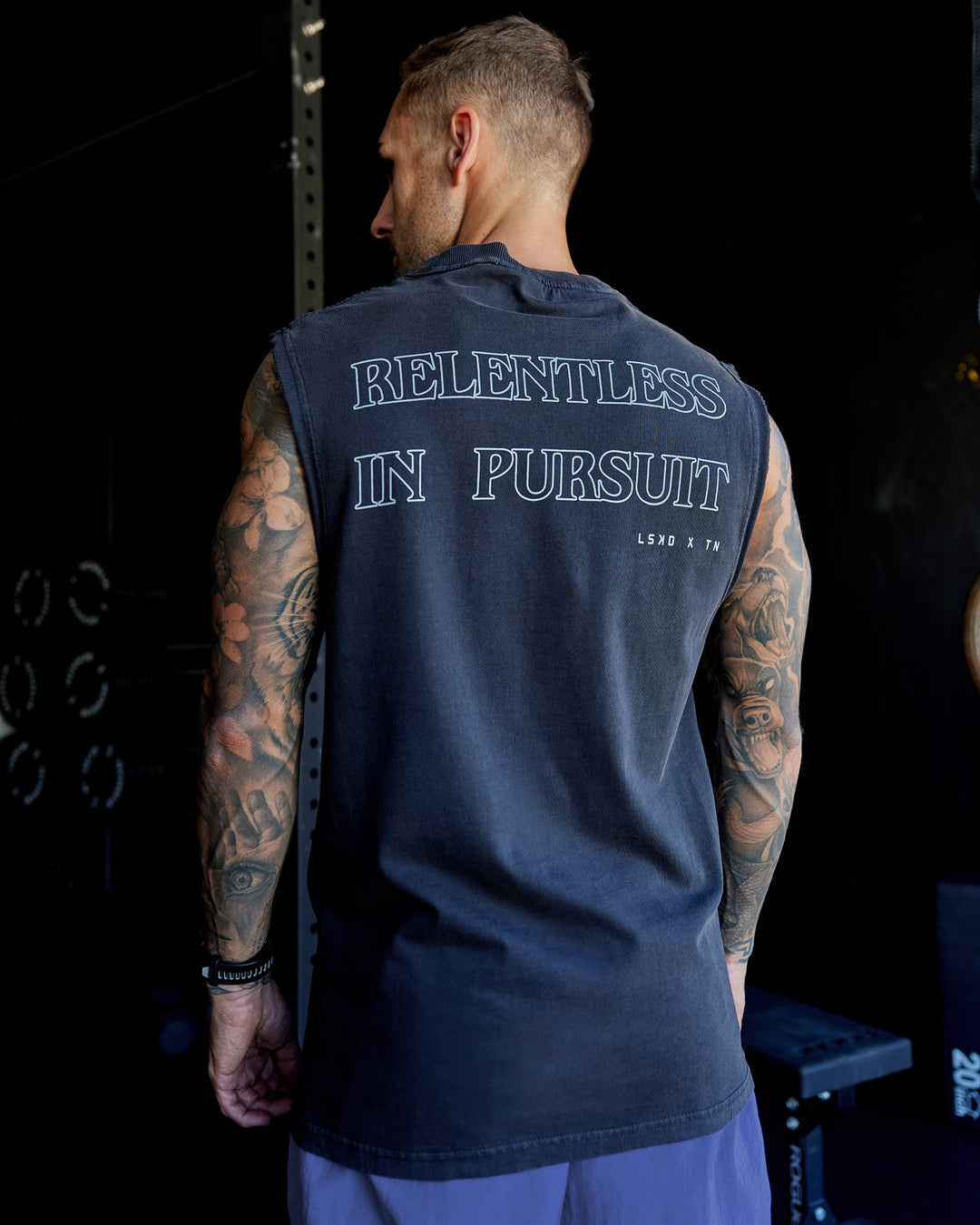Man wearing Washed Relentless Heavyweight Oversized Tank - Black-Grey | Model:Tommy | Size:S
