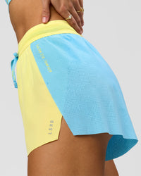 Woman wearing GG Accelerate 3" High-Rise Running Short - Baltic Sea-Lemon | Model:Grace | Size:XS