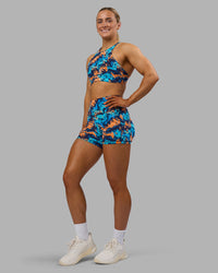 Woman wearing AMRAP High Neck Sports Bra - React Print | Model:Georgia | Size:S