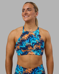 Woman wearing AMRAP High Neck Sports Bra - React Print | Model:Georgia | Size:S