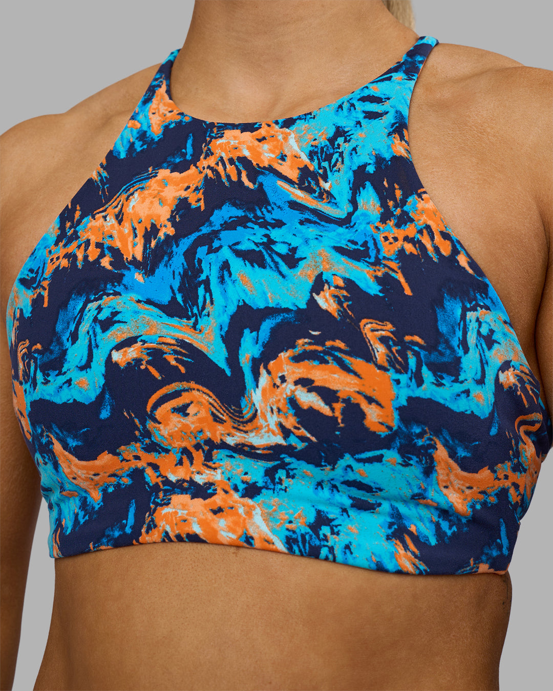 Woman wearing AMRAP High Neck Sports Bra - React Print | Model:Georgia | Size:S