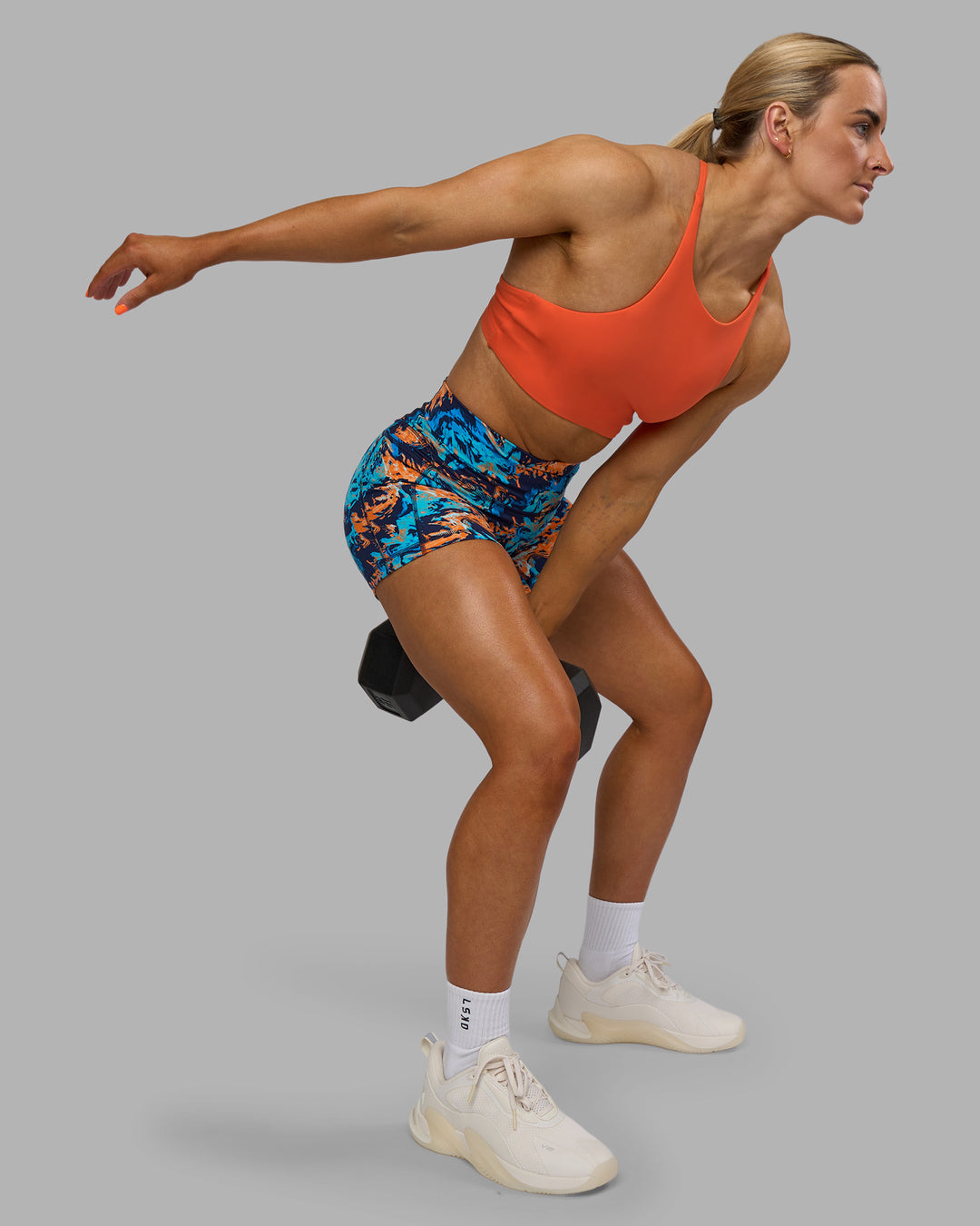 Woman wearing AMRAP High Neck Sports Bra - Ultra Orange | Model:Georgia | Size:S