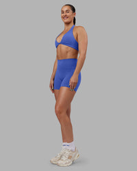 Woman wearing Abs Agile Halter Sports Bra - Power Cobalt | Model:Abbey | Size:S