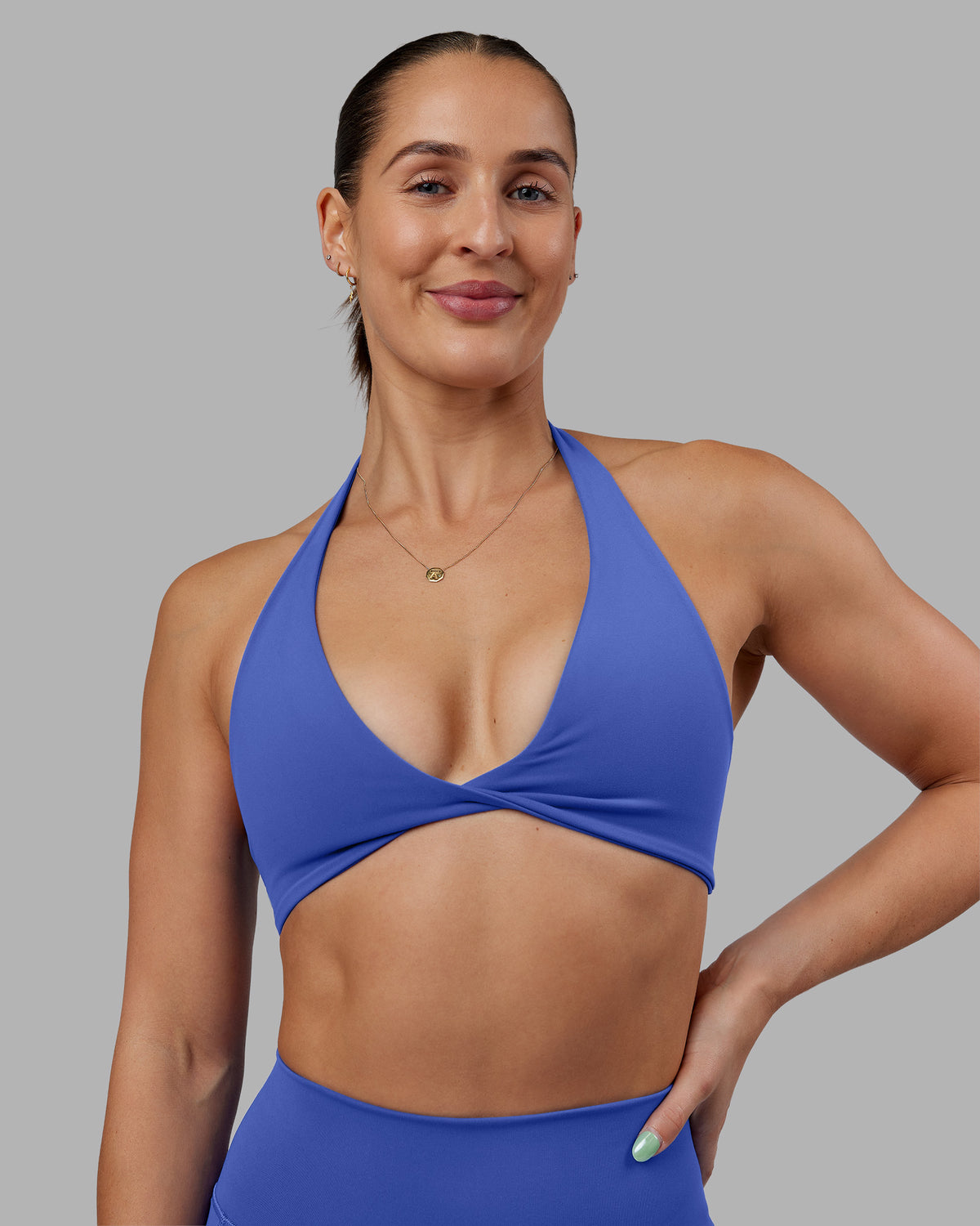 Woman wearing Abs Agile Halter Sports Bra - Power Cobalt | Model:Abbey | Size:S