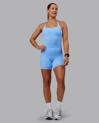 Woman wearing Abs Elixir Ultra High-Rise 6" Short Pockets - Open Air