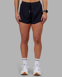 Woman wearing Accelerate 3" High-Rise Running Short - Black | Set:true | Angle:front | Model:Keisha | Size:S