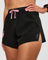 Woman wearing Accelerate 3" High-Rise Running Short - Black-Enjoy The Journey | Model:Rhiley | Size:S