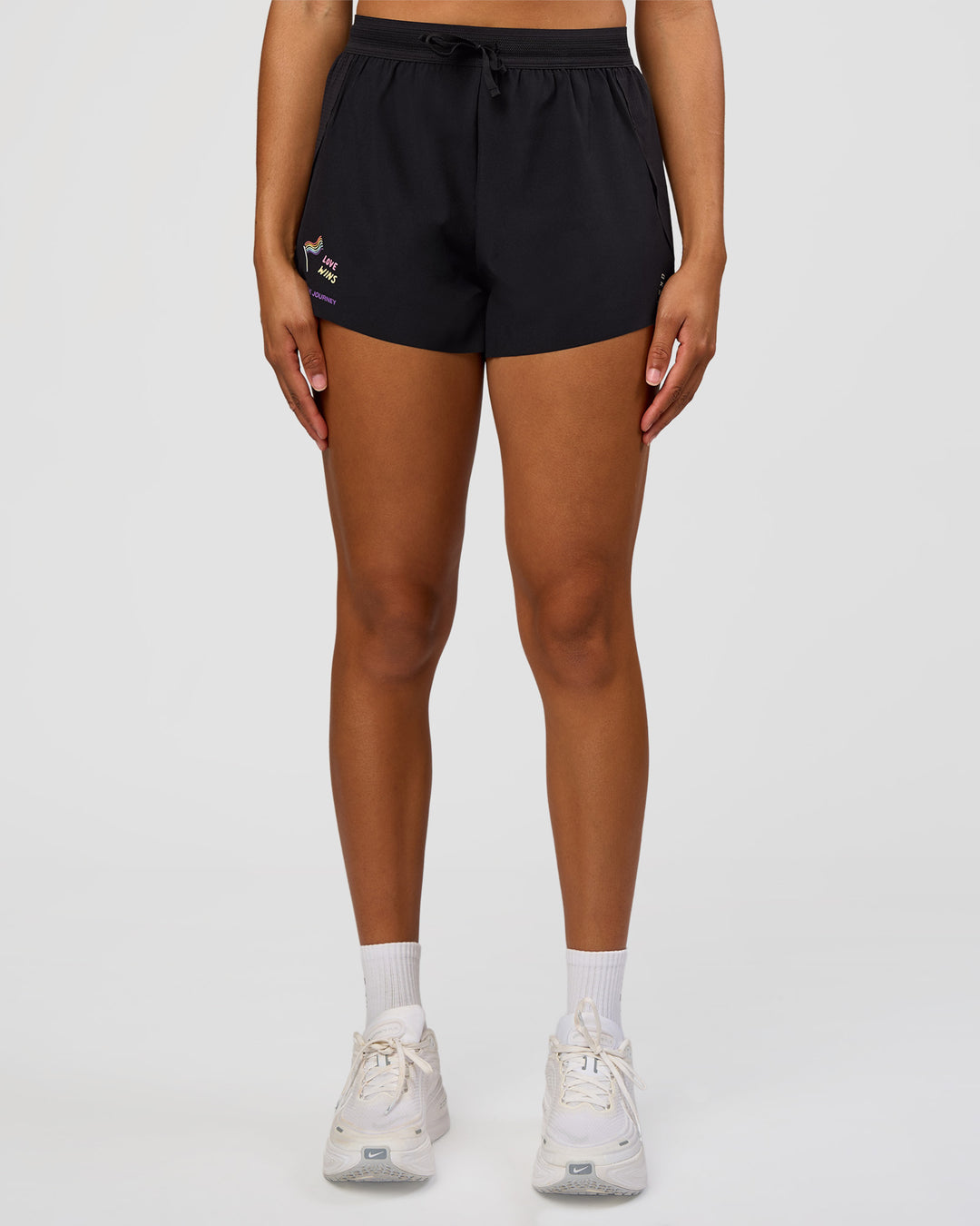 Woman wearing Accelerate 3" High-Rise Running Short - Black-Radiate | Model:Rosie | Size:S
