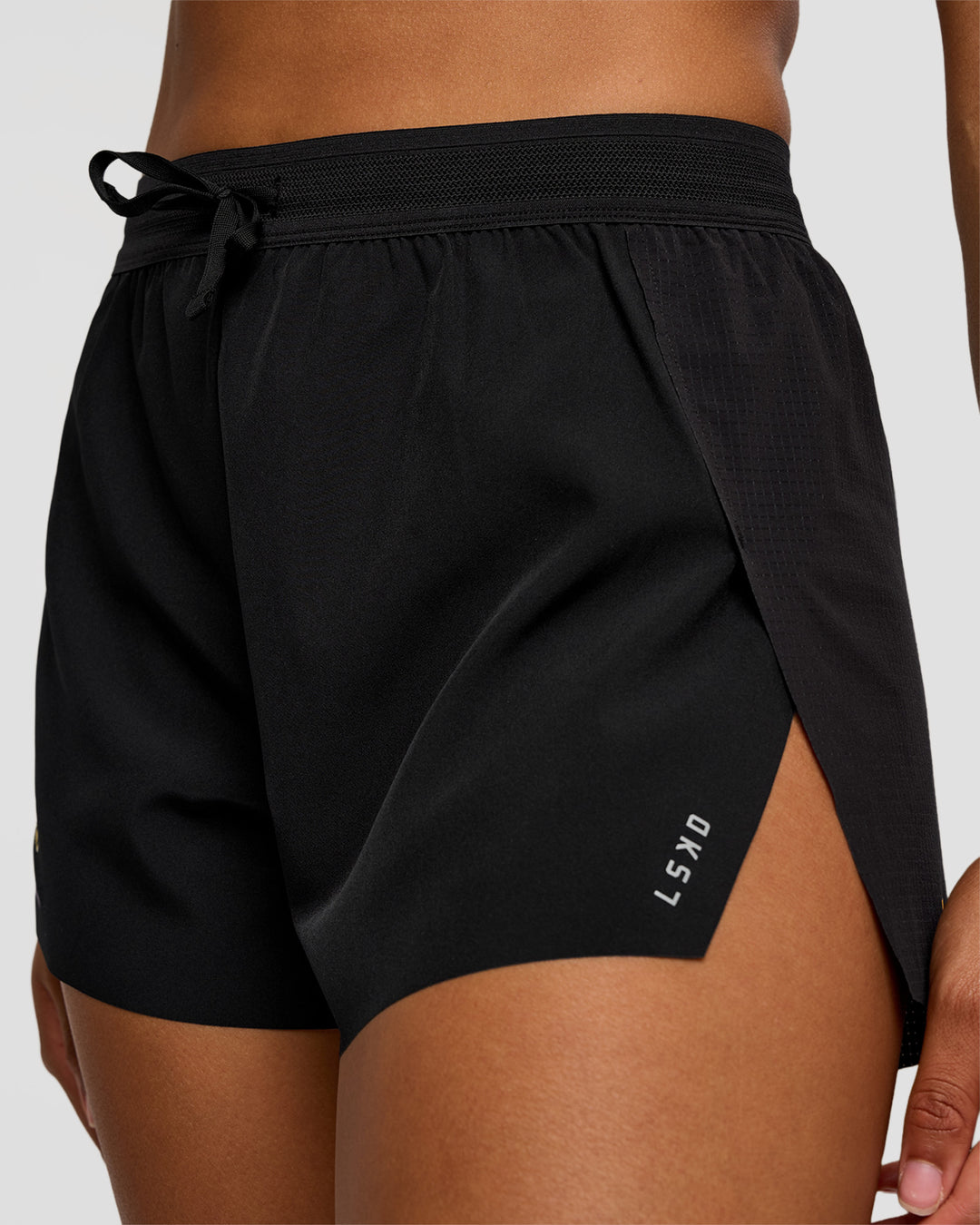 Woman wearing Accelerate 3" High-Rise Running Short - Black-Radiate | Model:Rosie | Size:S