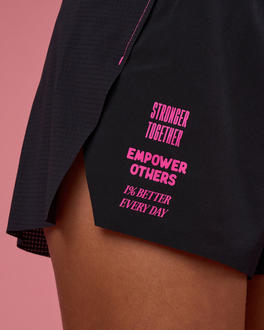 Woman wearing Accelerate 3&quot; High-Rise Running Short - Black-Ultra Pink | Model:Hannah | Size:S