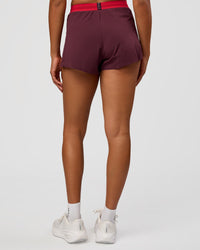 Woman wearing Accelerate 3" High-Rise Running Short - Cherry Lacquer-Scarlet | Model:Rosie | Size:S |