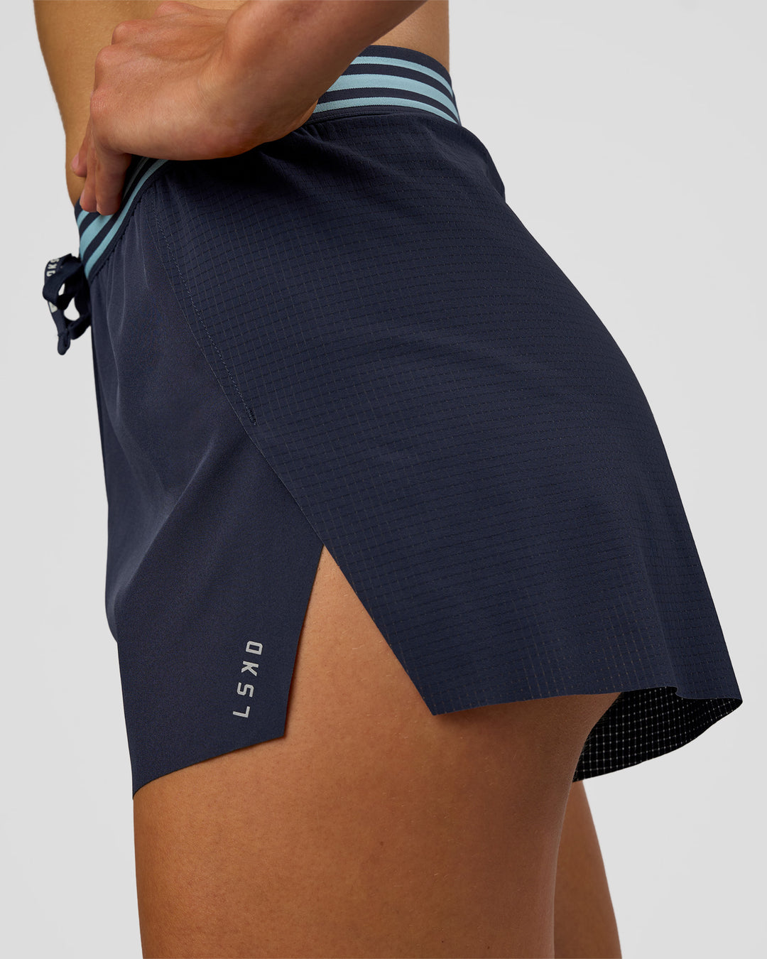 Woman wearing Accelerate 3" High-Rise Running Short - Future Navy-Baltic Sea | Model:Evie | Size:S