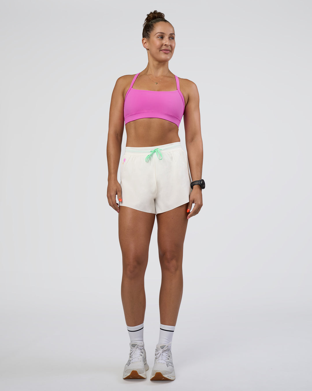 Woman wearing Accelerate 3&quot; High-Rise Running Short - Off White-Floral Sticker | Model:Abbey | Size:S