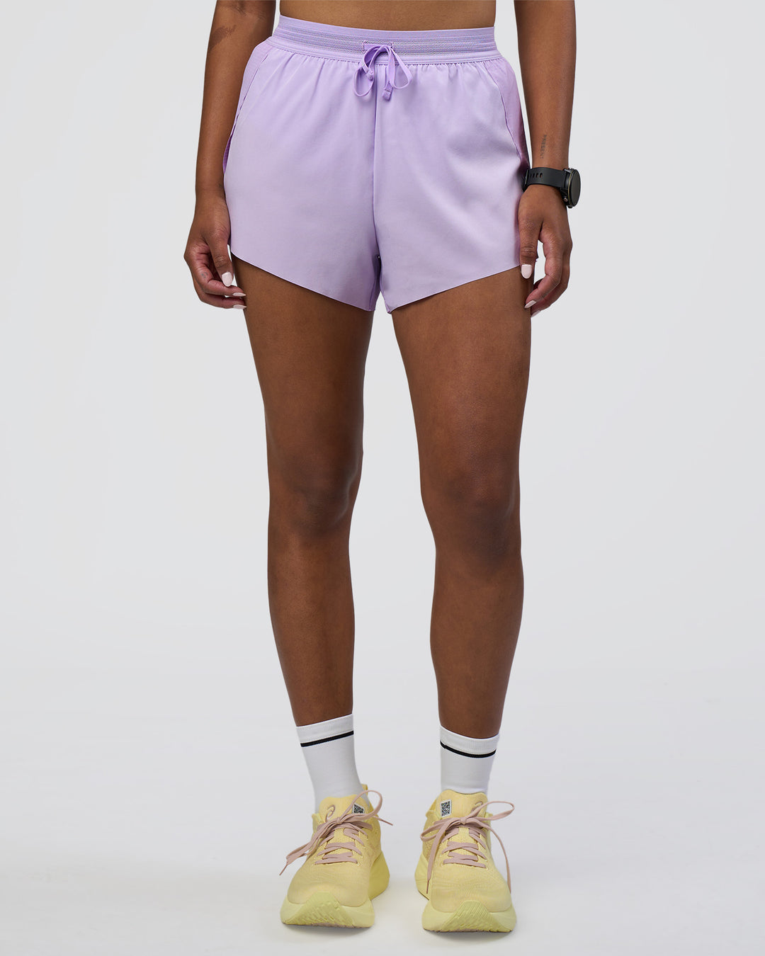 Woman wearing Accelerate 3&quot; High-Rise Running Short - Pale Lilac | Model:Rica | Size:S