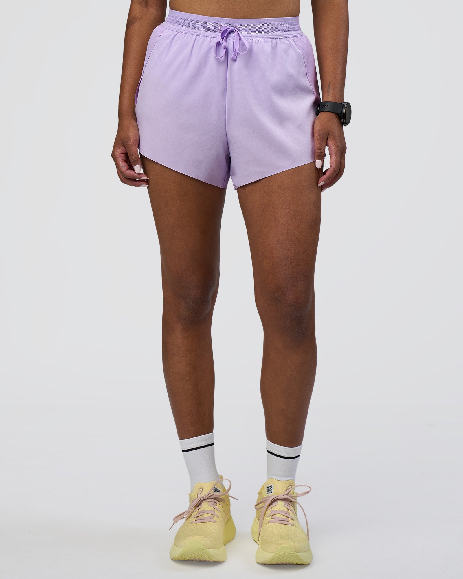 Woman wearing Accelerate 3" High-Rise Running Short - Pale Lilac | Model:Rica | Size:S
