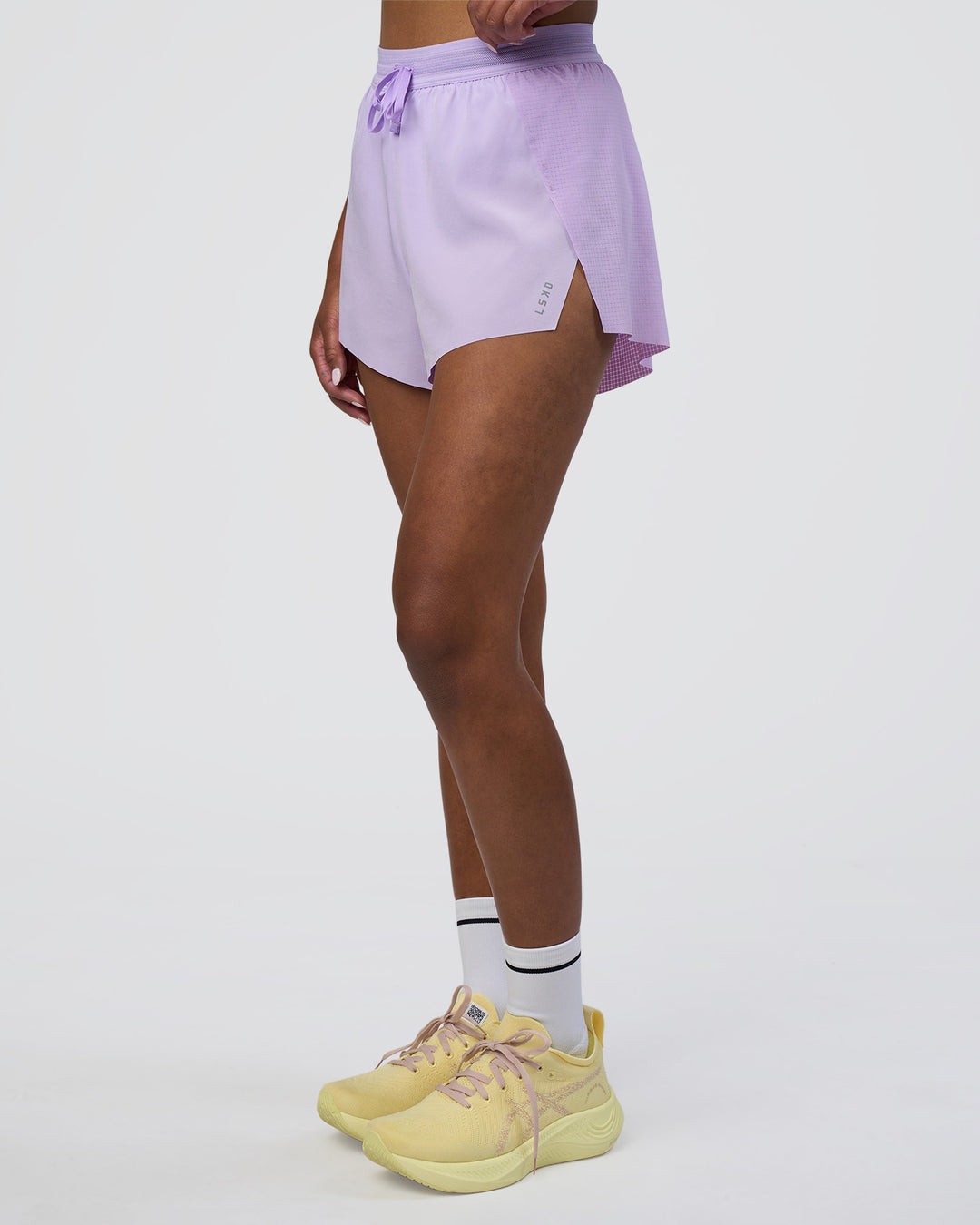 Woman wearing Accelerate 3&quot; High-Rise Running Short - Pale Lilac | Model:Rica | Size:S