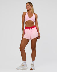 Woman wearing Accelerate 3" High-Rise Running Short - Scarlet-Marshmallow | Model:Amity | Size:S