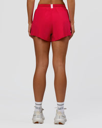 Woman wearing Accelerate 3" High-Rise Running Short - Scarlet-Marshmallow | Set:true | Angle:back | Model:Amity | Size:S