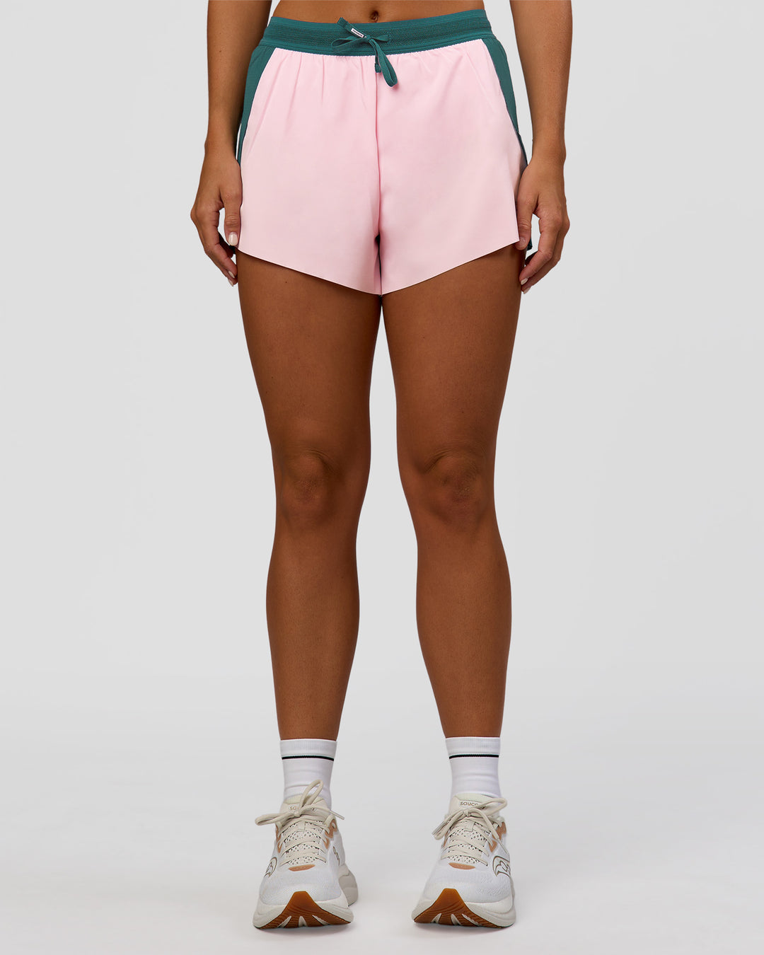 Woman wearing Accelerate 3" High-Rise Running Short - Transformative Teal-Marshmallow | Set:true | Angle:front | Model:Amity | Size:S