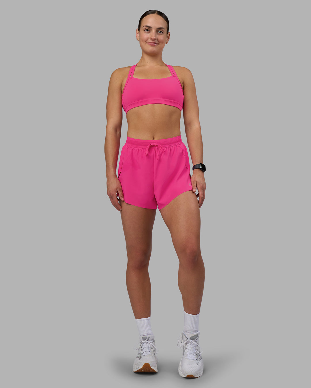 Woman wearing Accelerate 3&quot; High-Rise Running Short - Ultra Pink | Model:Keisha | Size:S