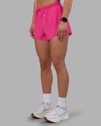 Woman wearing Accelerate 3" High-Rise Running Short - Ultra Pink | Set:true | Angle:side | Model:Keisha | Size:S | Thumbnail Index: 9