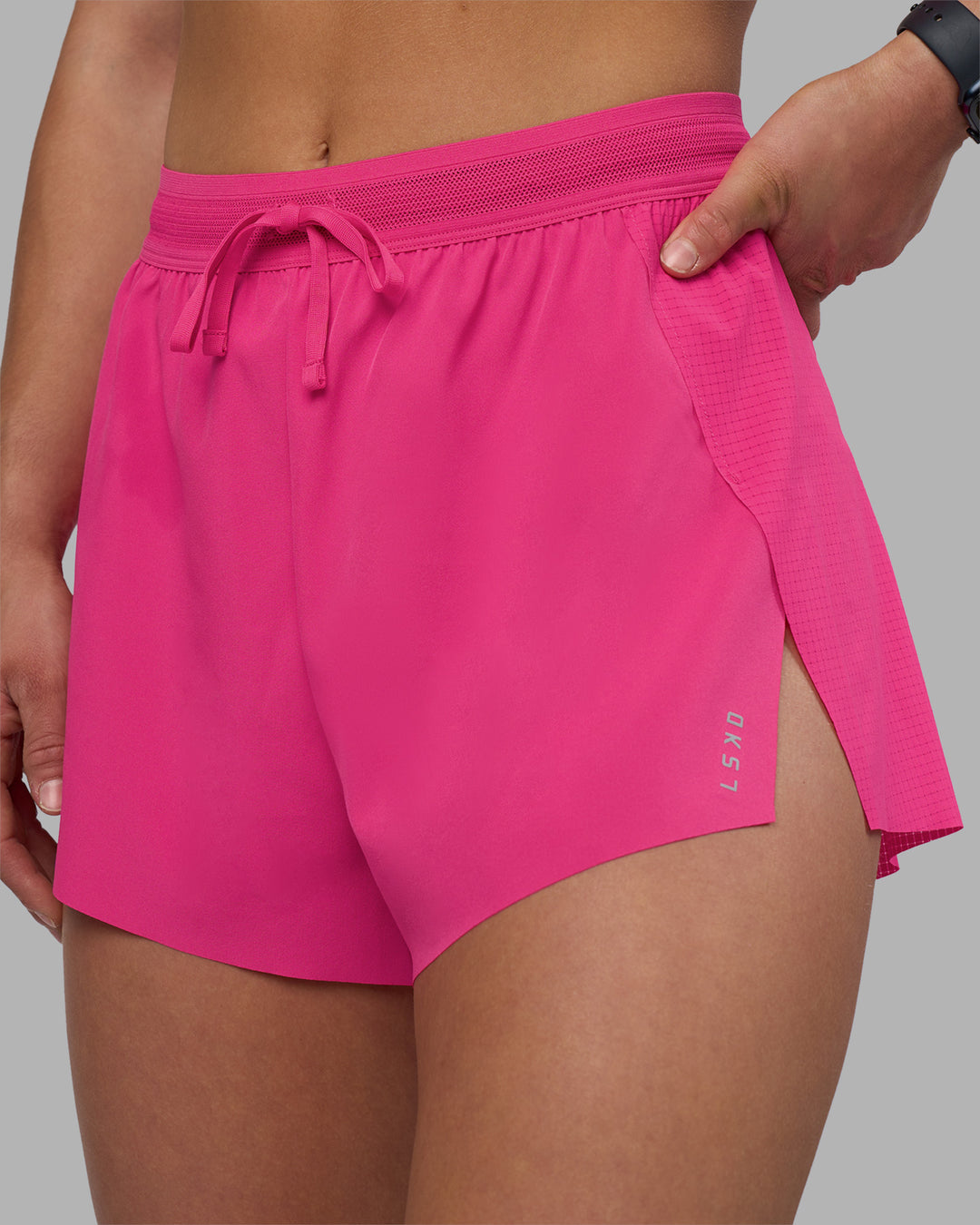 Woman wearing Accelerate 3" High-Rise Running Short - Ultra Pink | Model:Keisha | Size:S