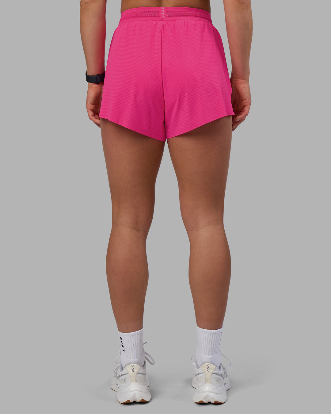 Woman wearing Accelerate 3&quot; High-Rise Running Short - Ultra Pink | Model:Keisha | Size:S