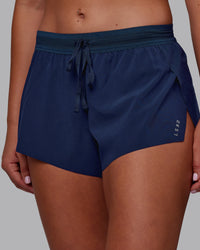 Woman wearing Accelerate 3" Running Short - Future Navy | Model:Charlize | Size:S
