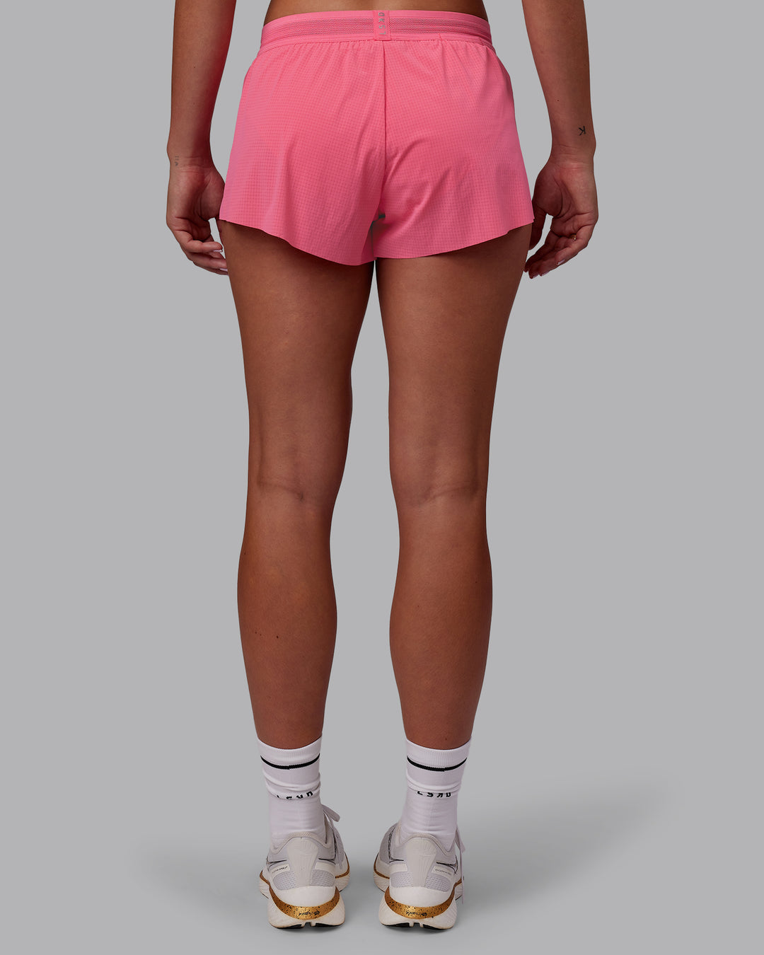 Woman wearing Accelerate 3&quot; Running Short - Pink Lemonade | Model:Charlize | Size:S